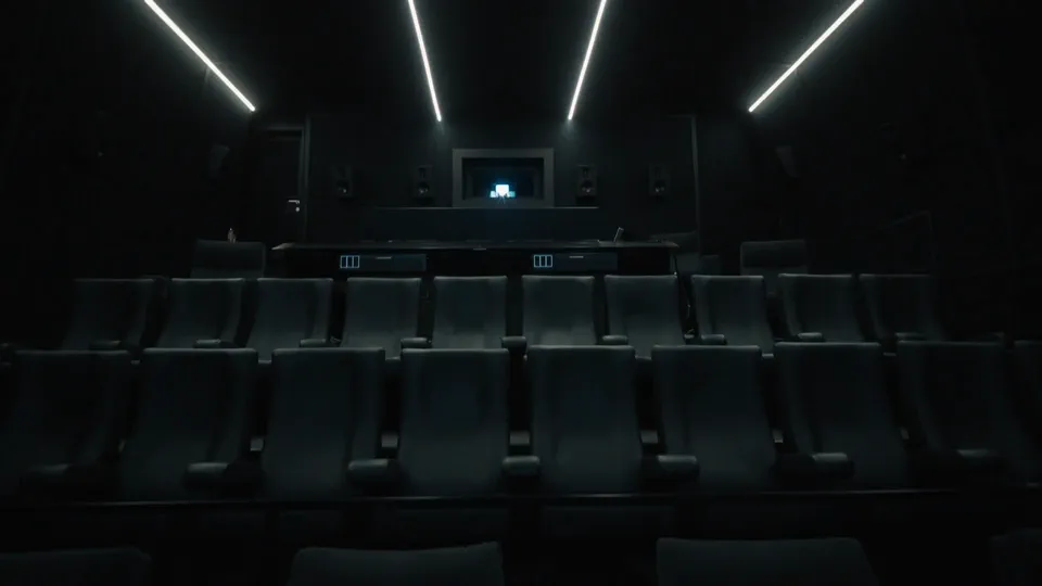 Private cinema with rows of reclining seats